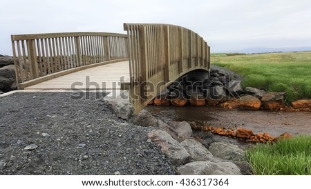 Wood bridge over  river.