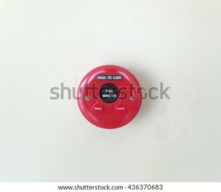 Red fire alarm isolated on white background