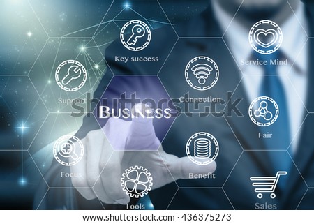 Businessman touching the Business icon with business success tools on Internet network concept background,Elements of this image furnished by NASA, Business technology concept 