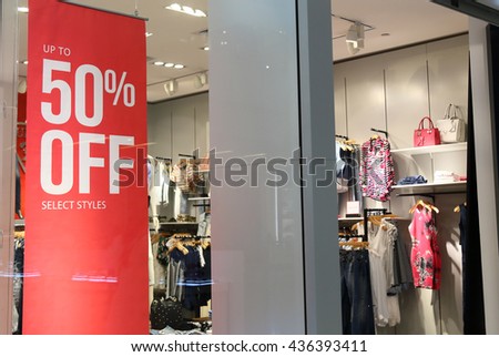 sale sign on cloth store