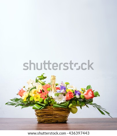 Bright flower bouquet in basket. Beautiful colourful bouquet