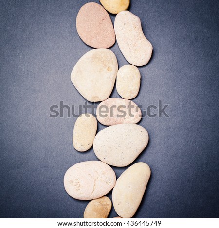 Spa with stone, rock for zen, beauty, balance, wellness on dark background. Concept of health, therapy, relaxation. Massage treatment for tranquil and harmony, relax.