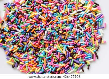 The colorful of little sprinkles , jimmies for cake decoration or ice cream topping for background