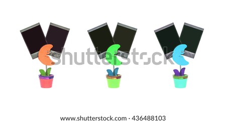 Closeup color clamp photo in moon shape in flowerpot with black blank film isolated on white background