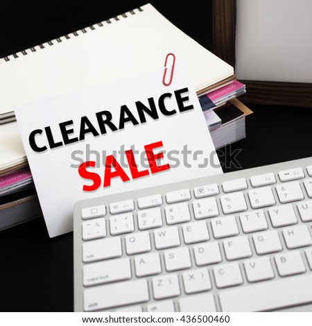 Word text Clearance sale on white paper card / business concept