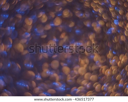 Circular motion blur effect. Abstract  golden background. Glitter bokeh abstract background, De focused abstract purple background.Glamour metallic  Background