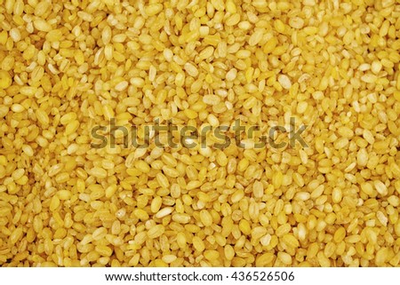 bulgur wheat background. Can be used for design, websites, interior, background, backdrop, texture creation, the use of graphic editors, illustration, to create seamless textures.