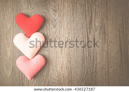 valentine colorful heart of love on vinyl wood background / dark tone