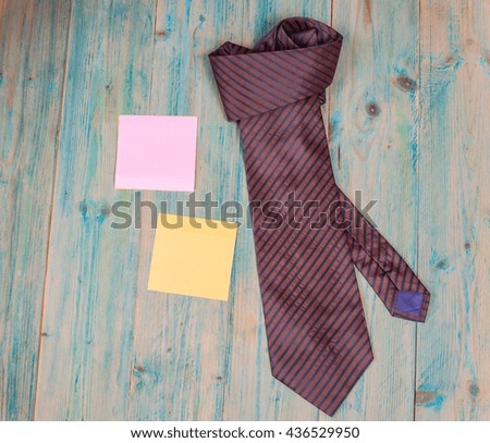 Fathers day composition of colorful tie laid on wooden
