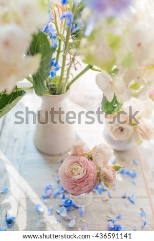 Vase with a delicate bouquet of pink roses