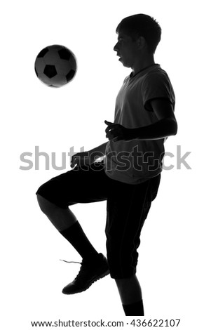 portrait of a football player with the ball