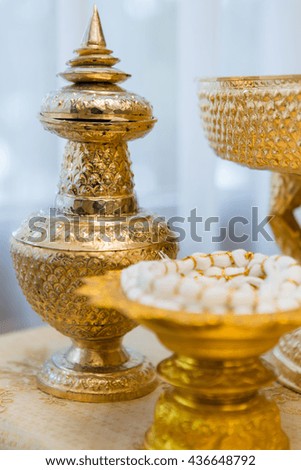 Holy thread, still life of holy thread in Thailand Gold tray with pedestal, Thailand Culture Wedding Ceremony or Religious ceremonies