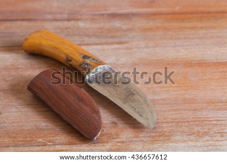 Knife hikes on wood  table
