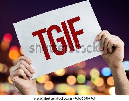TGIF placard with night lights on background