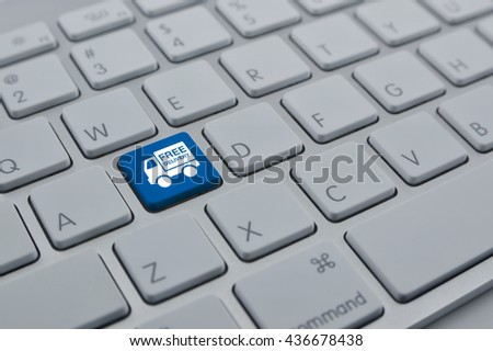 Free delivery truck icon on modern computer keyboard button, Transportation business concept