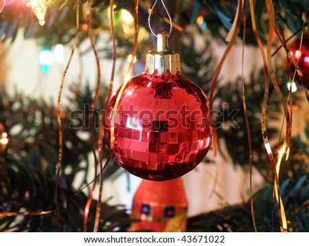 detail of red christmas decoration on christmas tree