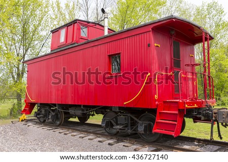 Old Red Wood Railroad Caboose Royalty-Free Stock Photo #436727140
