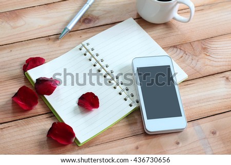 Smart phone with blank notebook and pen, coffee cup texture background for your design, business concept