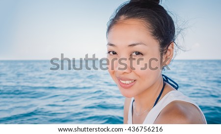 Asian woman on sea activities.