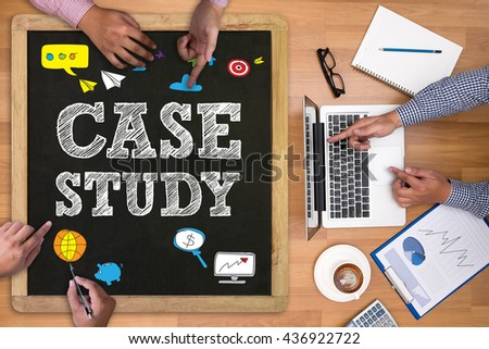 CASE STUDY  Businessman working at office desk and using computer and objects on the right, coffee,  top view,