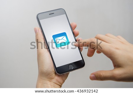 Close Up Person hand and Mobile Phone with email icon, Email concept. Royalty-Free Stock Photo #436932142