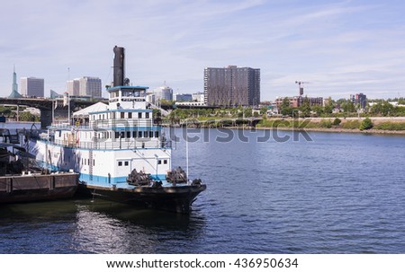 Portland, OR USA - June, 12th 2016. The Oregon Maritime Museum steam sternwheeler Portland is moored at the Willamette River in downtown Portland's Waterfront Park.