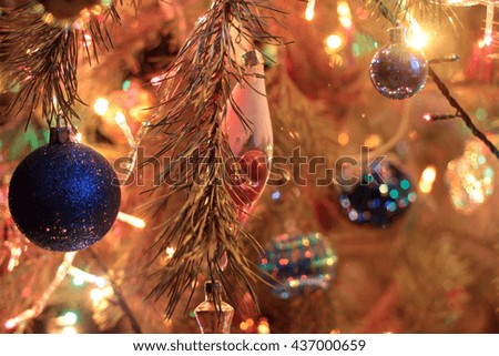 colorful festive Christmas tree ornaments and garland