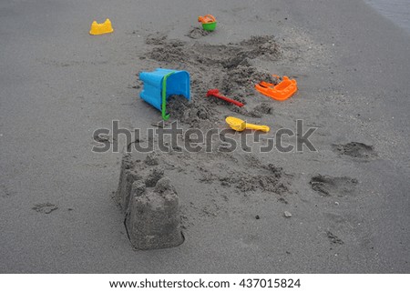 Sandcastles at the beach with bucket and spade