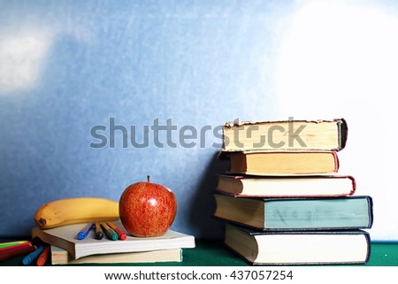 grunge effect photo education book stack apple pen