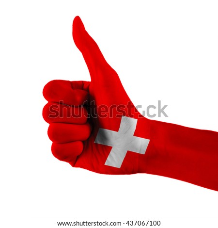 Switzerland or Swiss flag painted hand showing thumbs up sign on isolated white background with clipping path