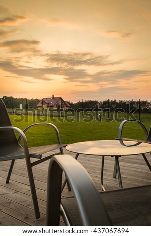 Close up of a patio furniture set, sunrise view