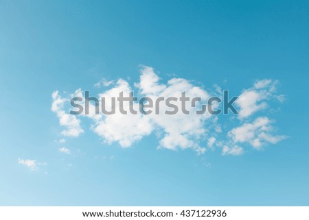 blue sky with white clouds in bright colors