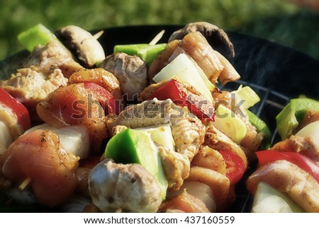 Grilling shashlik on barbecue grill (Selective focus)