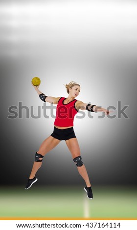 Female athlete with elbow pad throwing handball against digital image of handball field indoor