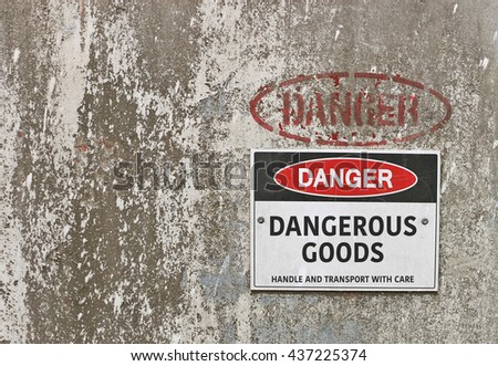 red, black and white Danger, Dangerous Goods warning sign