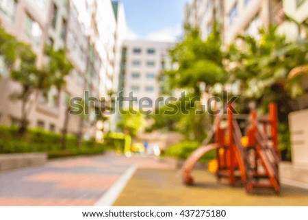 blur image of building in the city for background usage.