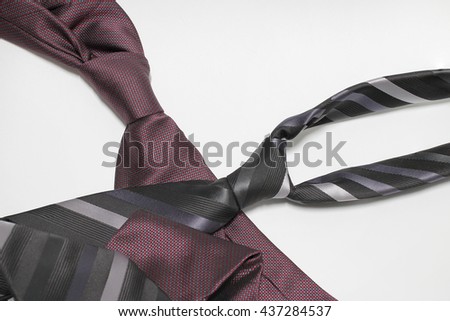 Happy Fathers Day with red, gray and black striped necktie on white background