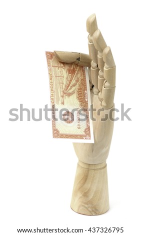 0.5 Cambodian riels bank note. Riel is the national currency of Cambodia. Money in hand wood on the white background.