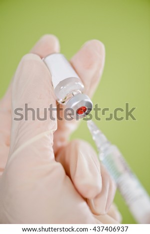 Filling syringe from vaccine vial