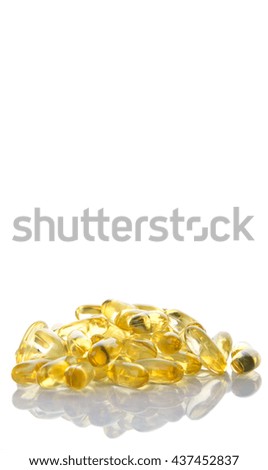 Fish oil supplement capsule over white background