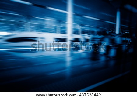 high-speed train at the railway station,motion blurred,tianjin china.