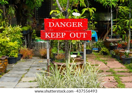 Danger keep out wooden sign panel posted