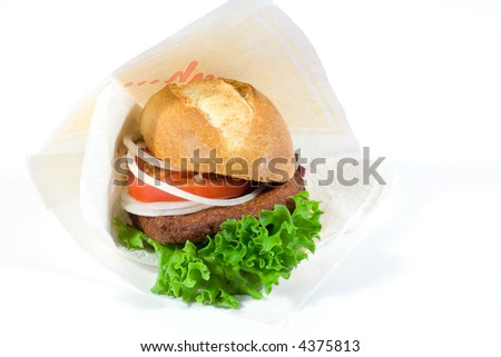 fishburger in the napkin isolated on white