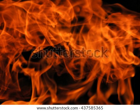 Texture of bright fire flames on a black background