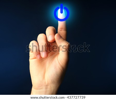 Finger press power button on virtual touch screen, modern technology concept