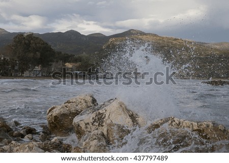 Greek Spring Sea Waves Crash Against Rocks