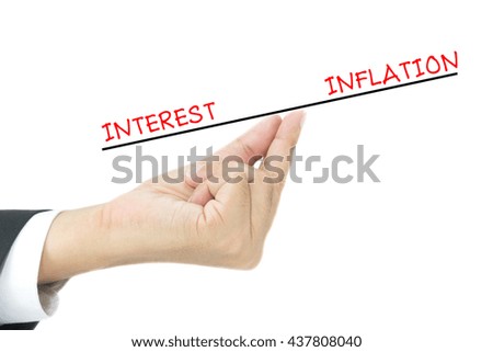 Interest and inflation on finger of business man