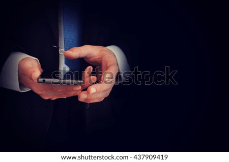 Businessman working on the smartphone