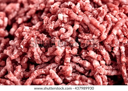 Close up of pinky raw ground beef.. Ground beef can be used to make hamburgers cutlet, chili con carne or other dishes.