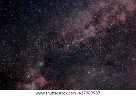 Space background with countless stars and bright nebulae